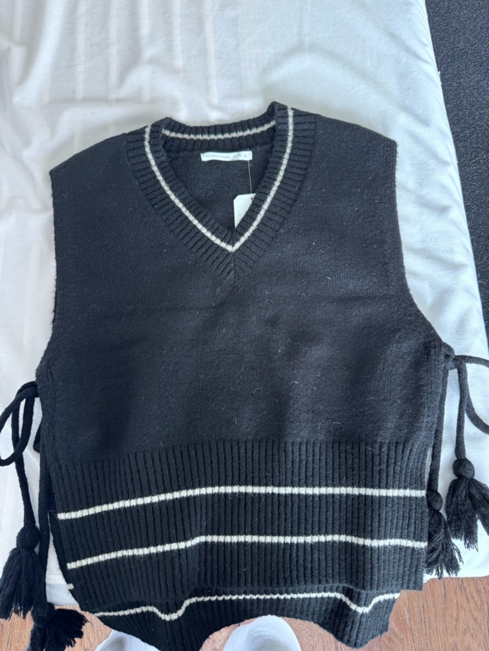 Black V-Neck Sweater Vest with White Stripe Detail